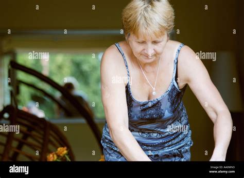 grandma bends over|Bent over and spread wide : r/WomenBendingOver .